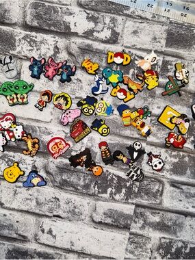 51pc Lot of Misc Jibbitz Shoe Charms for Crocs Harry Potter Pokémon Stitch Etc